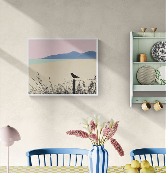 Landscape fine art canvas print titled A Quiet Strength by Norma Slack, featuring a muted blue mountain silhouette under a soft pink sky with a lone bird on a fence post.