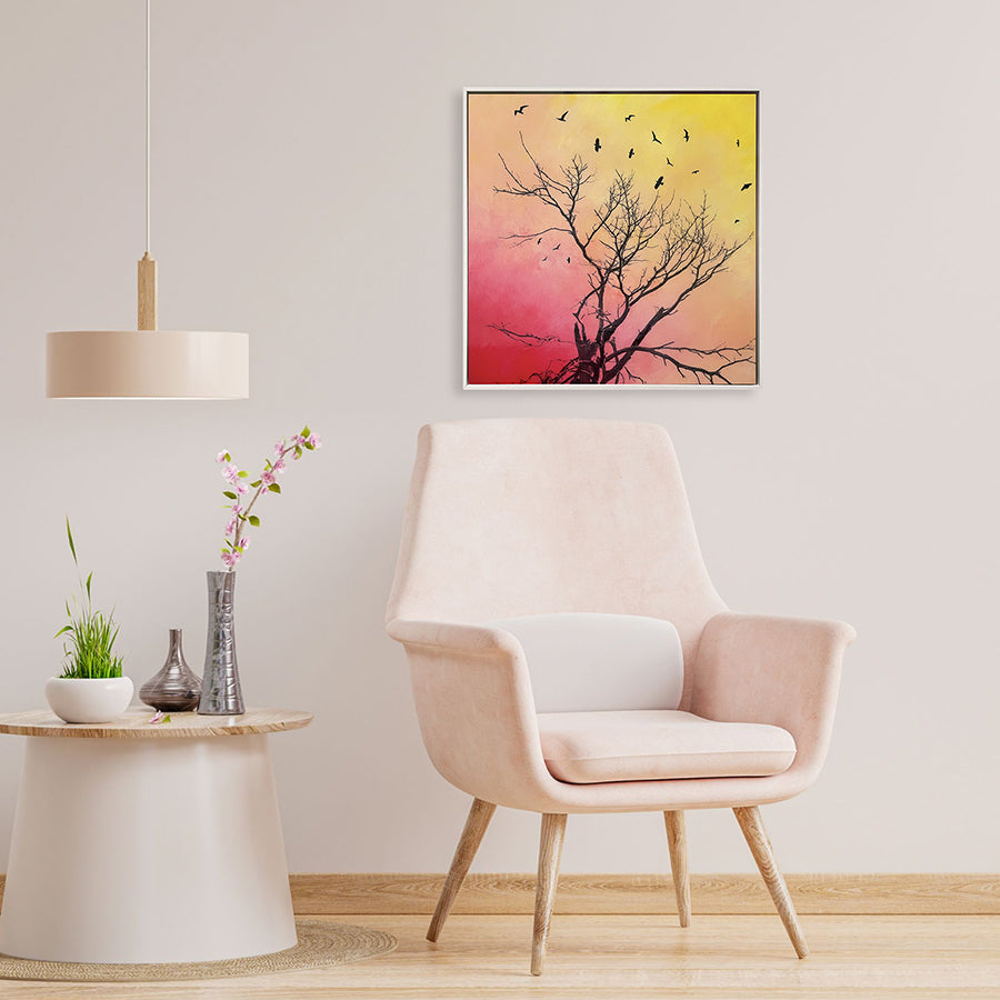 Fine art canvas print titled Joyful Ascent by Norma Slack, showing a gnarled tree silhouette and birds against a red to yellow gradient sky.