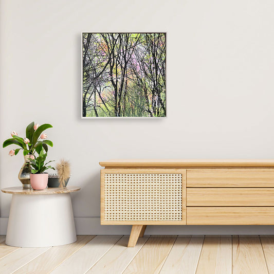 Square fine art canvas print titled The Path Through by Norma Slack, showing birds flying through a woodland with a pink and green abstract sky.